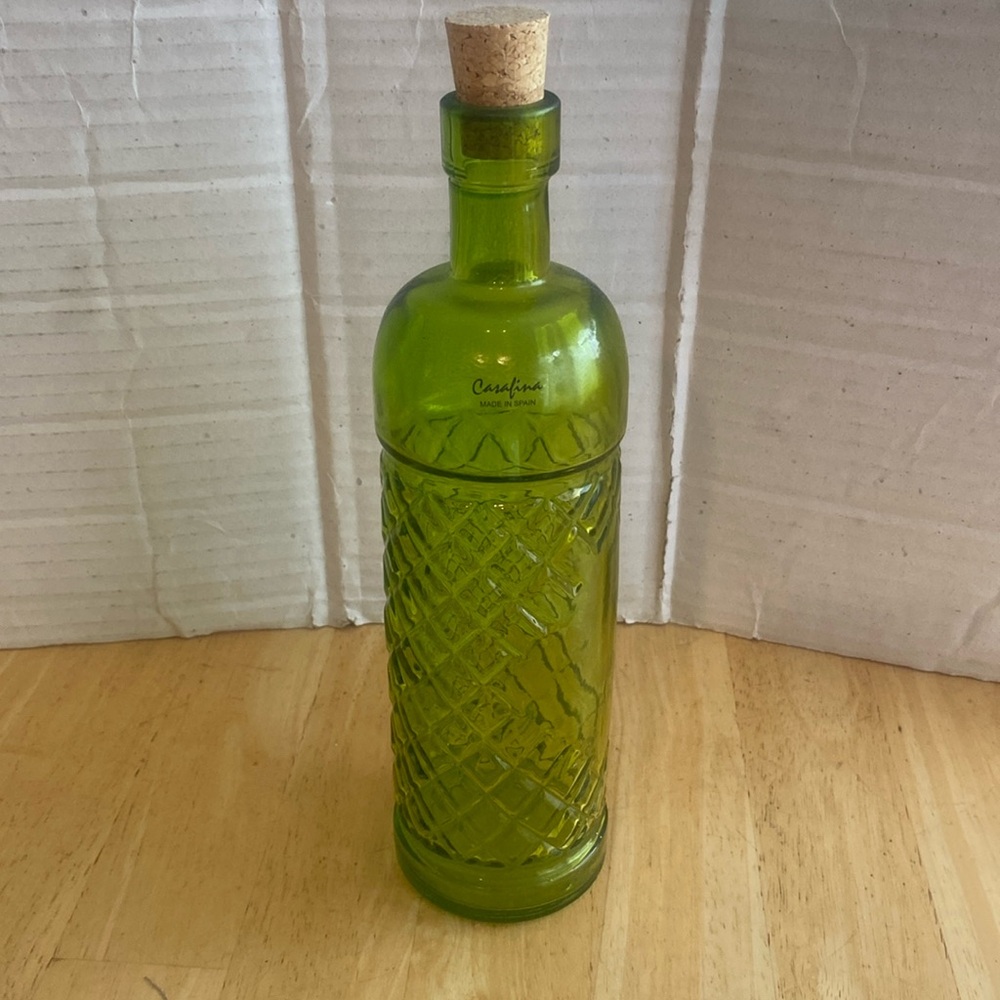 Beautiful green glass decorative or useful bottle. Made in Spain. NWOT.